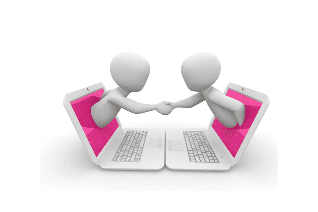 A figure shaking hands out of two laptops