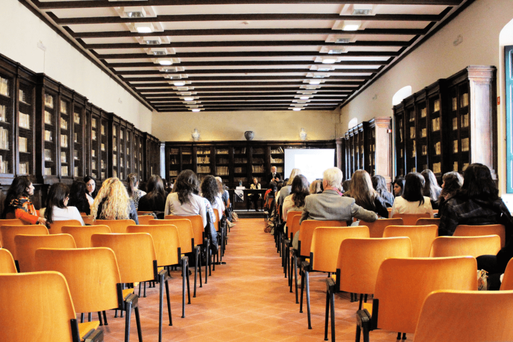 A conference.  People are in chairs